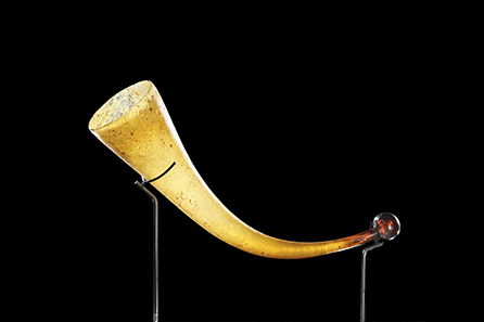47 Roman drinking horn made of amber-coloured glass. 3rd to 4th cent. AD. Estimate: 12.000 Euro. Final Price: 76.700 Euro