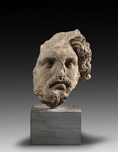 Lot 125: Bearded head. Late Classical / early Hellenistic times, 4th-3rd cent. BC. H. 22 cm. Fragmentary, surface sintered. Ex Dr W.S. Collection, Southern Germany, since the 1970s. Estimate: 2,500,- euros. Hammer price: 42,000,- euros.