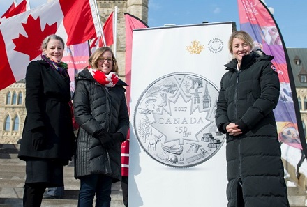 From left: Royal Canadian Mint CEO Sandra Hanington, Minister of Democratic Institutions Karina Gould and Minister of Canadian Heritage Mélanie Joly unveil a new silver collector coin celebrating Canada 150.