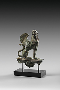 10 Archaic bronze figure of a sphinx sitting on a double volute base. Late Archaic period, about 500 BC. Estimate: 20.000 Euro. Final Price: 70.800 Euro