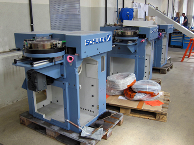 A whole series of edge rimming machines. Photograph: UK.