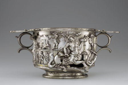 Cup with Centaurs and Cupids. Roman, 1-100 CE. Inscription: “MERCVRIO AVGVSTO Q DOMITIVS TVTVS EX VOTO” (To Augustan Mercury, Quintus Domitius Tutus in fulfillment of a vow). Find-spot: Berthouville, France. Silver and gold, H. 11.7 cm; W. 26.8 cm; D. 17.4 cm. Bibliothèque nationale de France, Paris: Inv. 56.7. Photo: Tahnee Cracchiola © Getty-BnF.