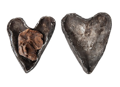 Human heart in heart-shaped lead and silver case. Found concealed in a niche in the pillar in the crypt beneath Christ’s Church, Cork, 12th or 13th century. 2.3 x 1.6 cm. © Pitt Rivers Museum, University of Oxford.