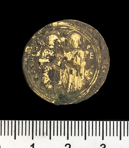 Flat shaped nomisma histamenon of Romanos III Argyrus (1028 - 1034). Photo: Clara Amit, Israel Antiquities Authority.
