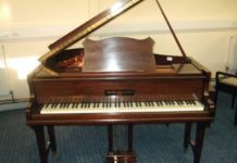 Piano tuner finds gold treasure