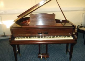 Piano tuner finds gold treasure