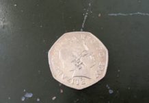Nazi symbols defacing British coins