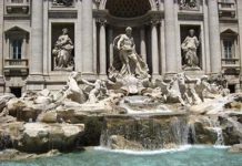 Coins in the fountain well: Trevi Fountain in Rome