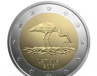 Latvia issues 2 euro coin featuring nesting stork