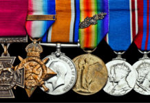 Medals of first private soldier to be awarded the V.C. in the Great War at Spink