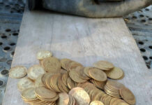 A Dream Come True: Craftsmen Discover Hidden Treasure of Gold Coins